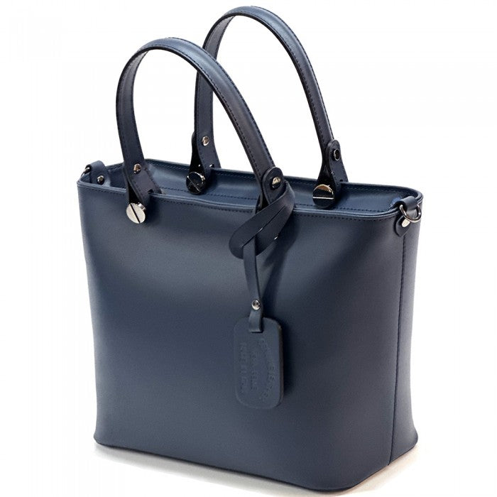 A navy blue leather tote bag with two handles and a detachable shoulder strap.