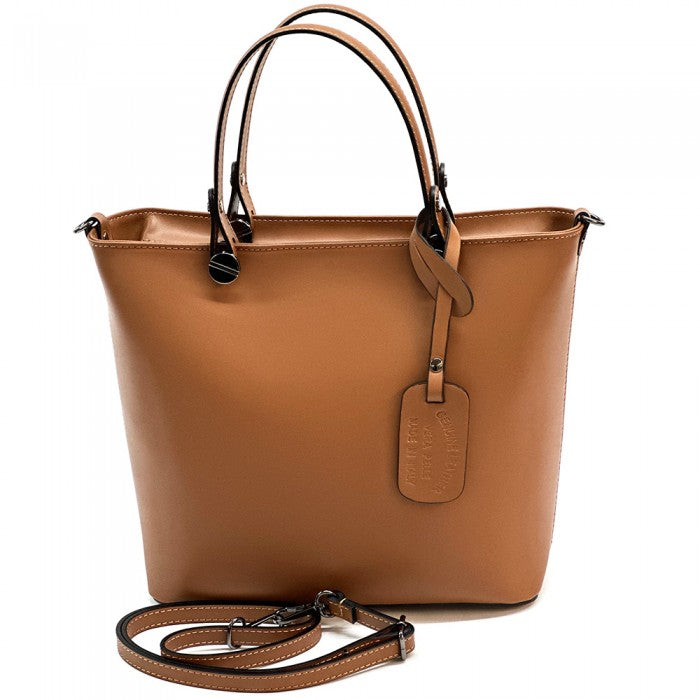A leather tote bag with two handles and a detachable shoulder strap.