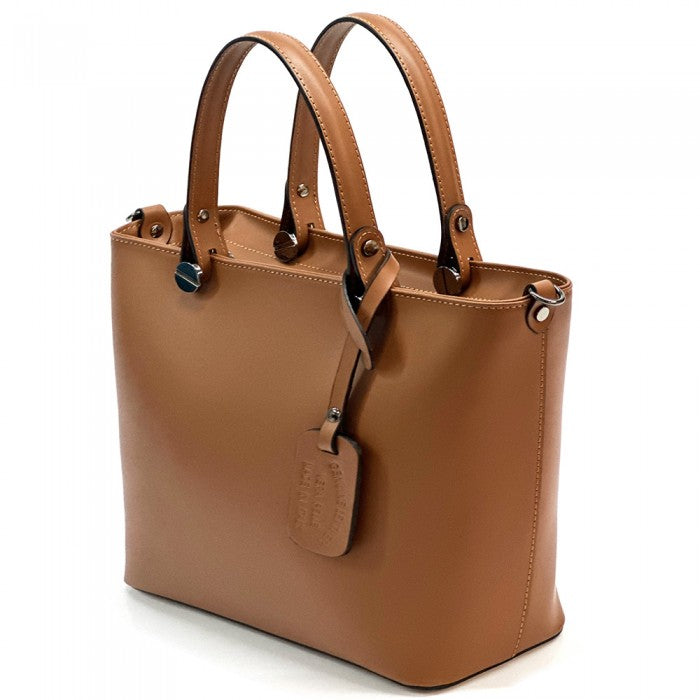A leather tote bag with two handles and a detachable shoulder strap.
