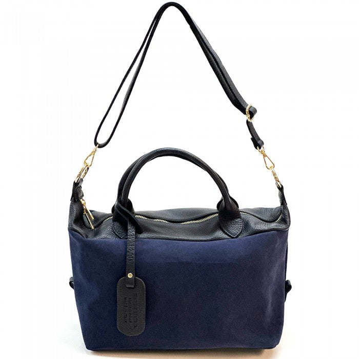 A navy blue leather Boston bag with dual top handles and a detachable shoulder strap.