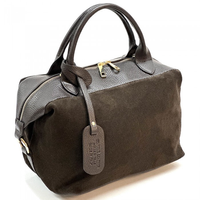 A navy blue Emma Leather Boston Bag with suede texture and black leather trimmings, featuring dual top handles and a detachable shoulder strap.