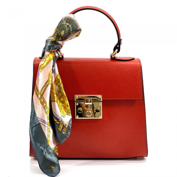 A Bella Mini Tote handbag with a silk scarf wrapped around the handle, featuring a gold-tone twist lock and a detachable shoulder strap.