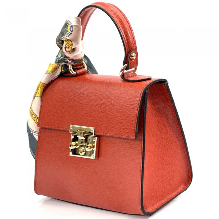 A Bella Mini Tote handbag with a silk scarf wrapped around the handle, featuring a gold-tone twist lock and a detachable shoulder strap.