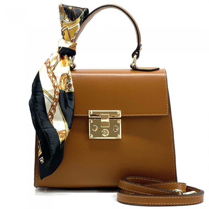 A Bella Mini Tote handbag with a silk scarf wrapped around the handle, featuring a gold-tone twist lock and a detachable shoulder strap.
