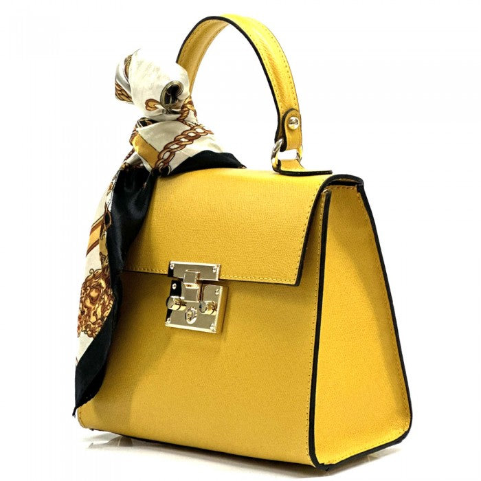 A Yellow Bella Mini Tote handbag with a silk scarf wrapped around the handle, featuring a gold-tone twist lock and a detachable shoulder strap.