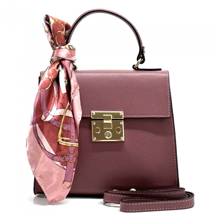 A purple Bella Mini Tote handbag with a silk scarf wrapped around the handle, featuring a gold-tone twist lock and a detachable shoulder strap.