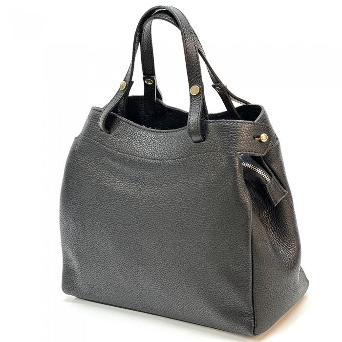 A black Siena handbag made of premium Italian leather, featuring a structured silhouette with soft curves and gold-tone hardware, designed for both casual and formal settings.