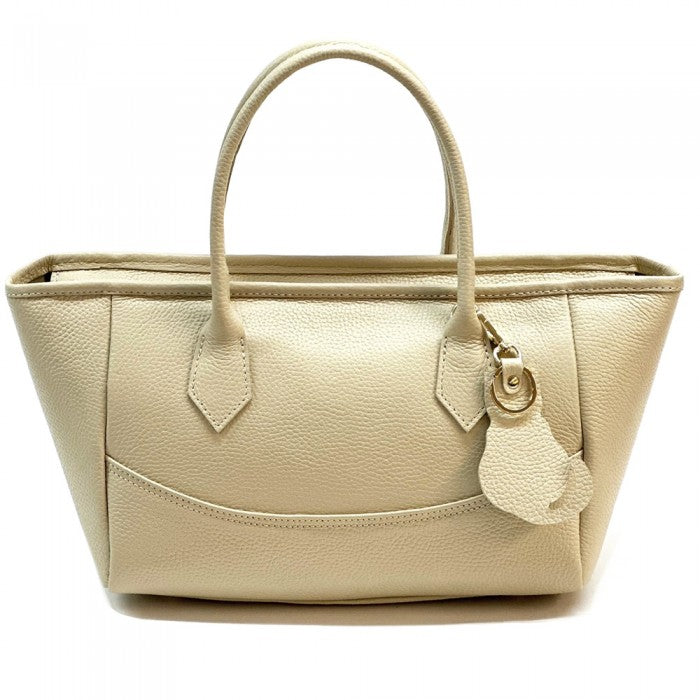 A Beig Italian leather tote bag with twin handles and a detachable leather keychain.