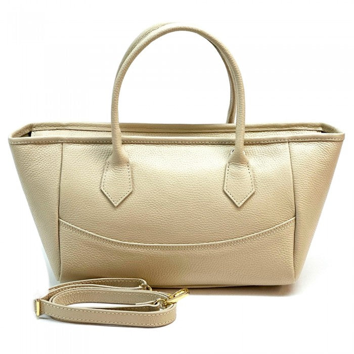 A Beig Italian leather tote bag with twin handles and a detachable leather keychain.
