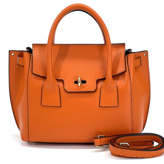 A pink Italian leather handbag with a structured design, double handles, and a gold-tone clasp.