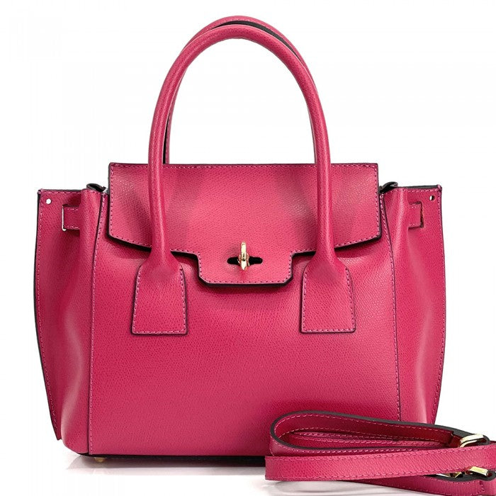 A pink Italian leather handbag with a structured design, double handles, and a gold-tone clasp.