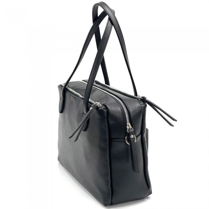A Annabella Leather Handbag with double handles and a removable shoulder strap, displayed against a white background.