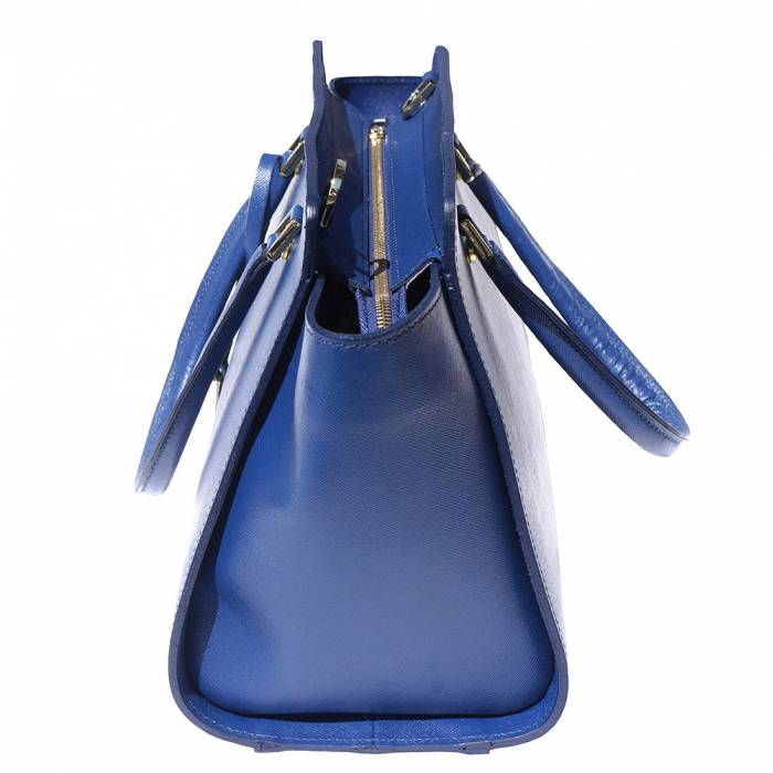 A blue leather handbag with golden metal hardware and a decorative tag on one of the handles.