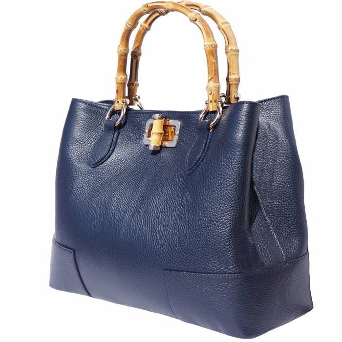 A green Fabrizia leather handbag with bamboo handles and a turn-lock closure.