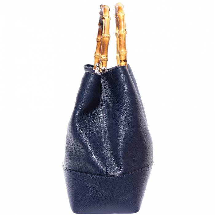 A green Fabrizia leather handbag with bamboo handles and a turn-lock closure.