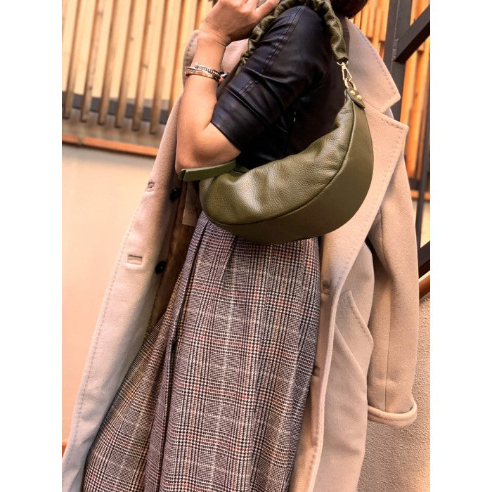 A green Tara Small Hobo leather handbag with a single handle and adjustable shoulder strap.