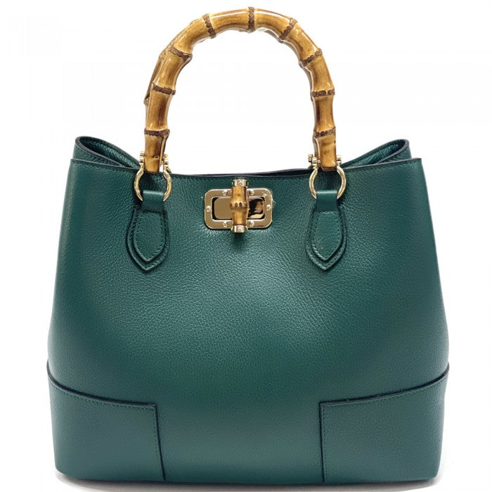 A green Fabrizia leather handbag with bamboo handles and a turn-lock closure.