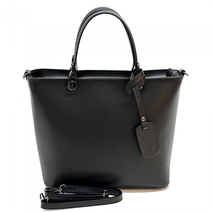 A  leather tote bag with two handles and a detachable shoulder strap.
