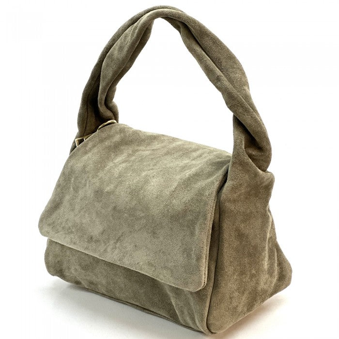 A beige suede leather handbag with a shoulder strap and a roomy compartment, crafted with premium-quality Italian suede leather.