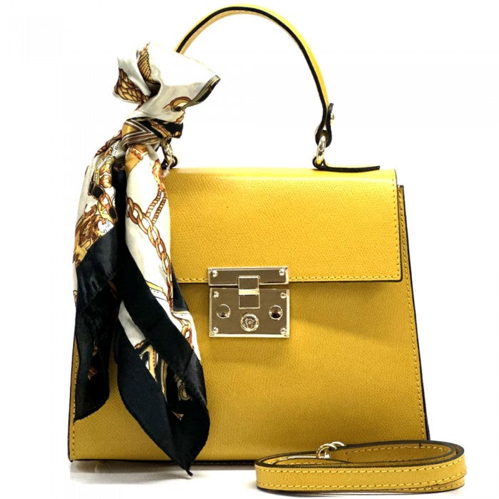 A Yellow Bella Mini Tote handbag with a silk scarf wrapped around the handle, featuring a gold-tone twist lock and a detachable shoulder strap.