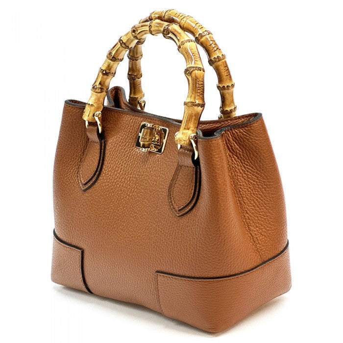 A Fabrizia small leather handbag with bamboo handles and a front pocket detail.