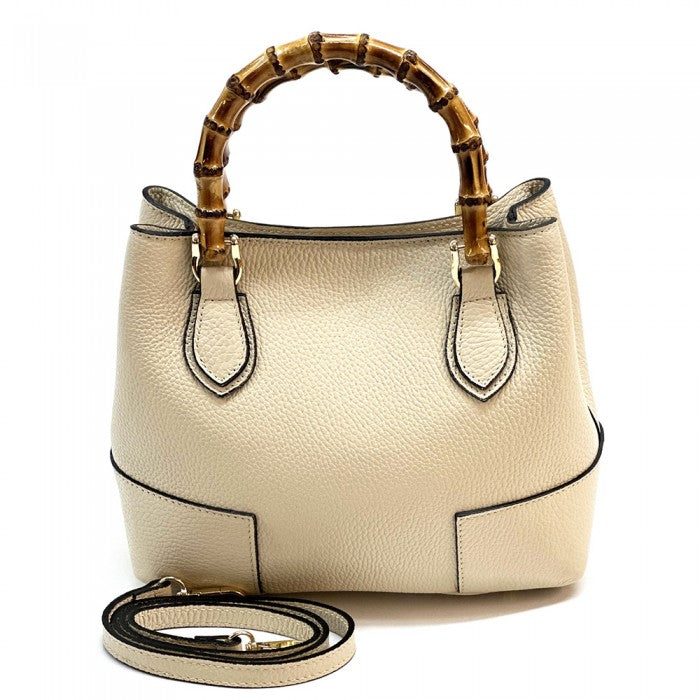 A Fabrizia small leather handbag with bamboo handles and a front pocket detail.