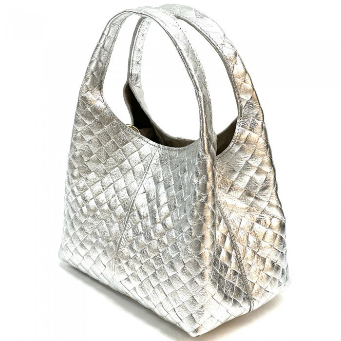 A quilted Italian leather hobo bag with a metallic gold finish and a soft, textured surface. It features two handles and a detachable shoulder strap.