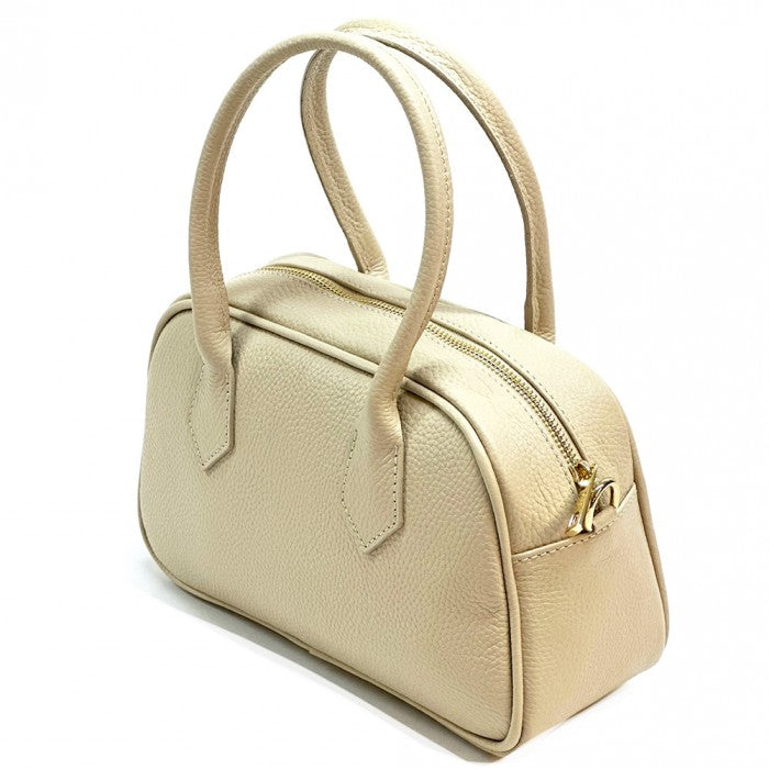 A beige Bella Vita leather handbag with double handles and a zip closure, made from Italian leather.