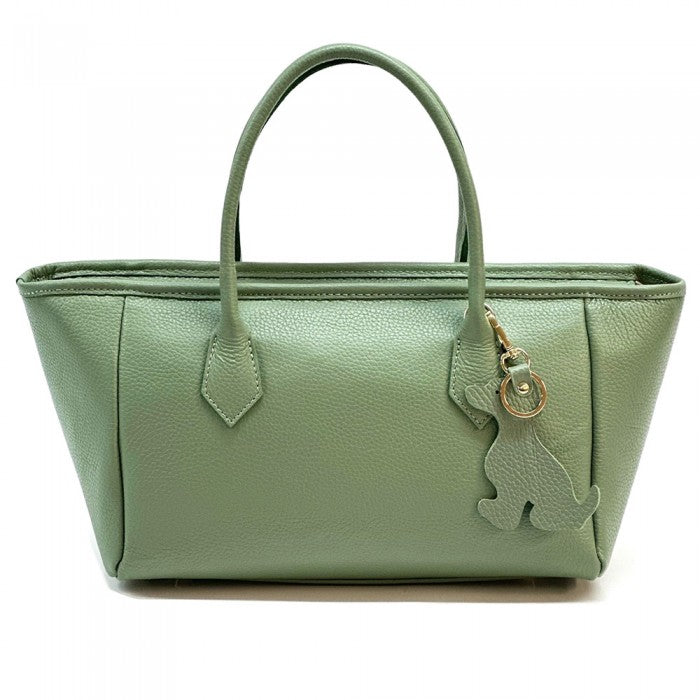A green Italian leather tote bag with twin handles and a detachable leather keychain.