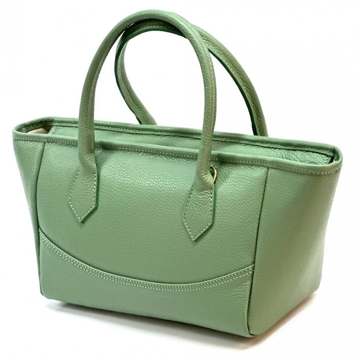 A green Italian leather tote bag with twin handles and a detachable leather keychain.