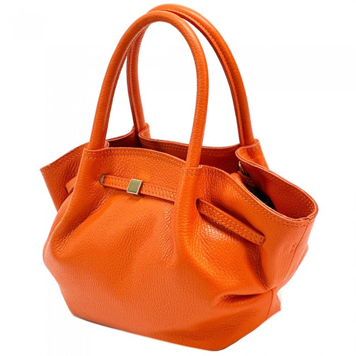 A brown Terra Italian handmade leather handbag with double rounded top handles and a central metallic snap closure.