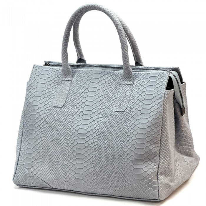 A blue genuine leather tote bag with a python print texture, featuring sturdy double handles and a structured shape.