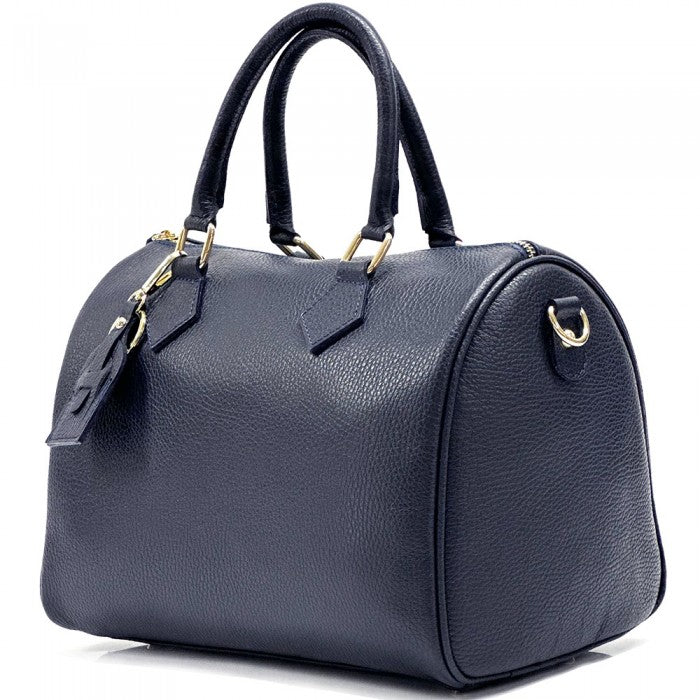 A light purple Erminia GM cow leather handbag with visible texture, two handles, and metallic hardware.