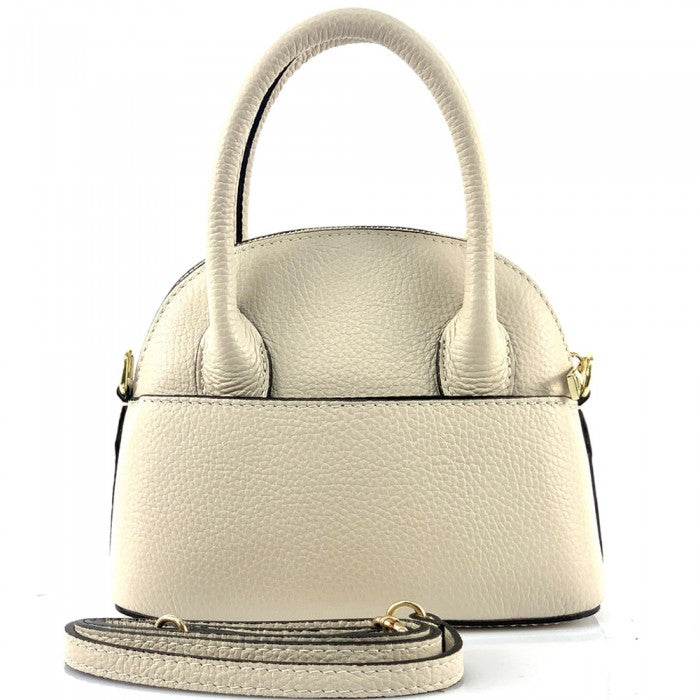 A Bellaria Italian leather shell bag with double top handles and a gold-tone zipper.