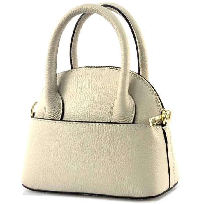A Bellaria Italian leather shell bag with double top handles and a gold-tone zipper.