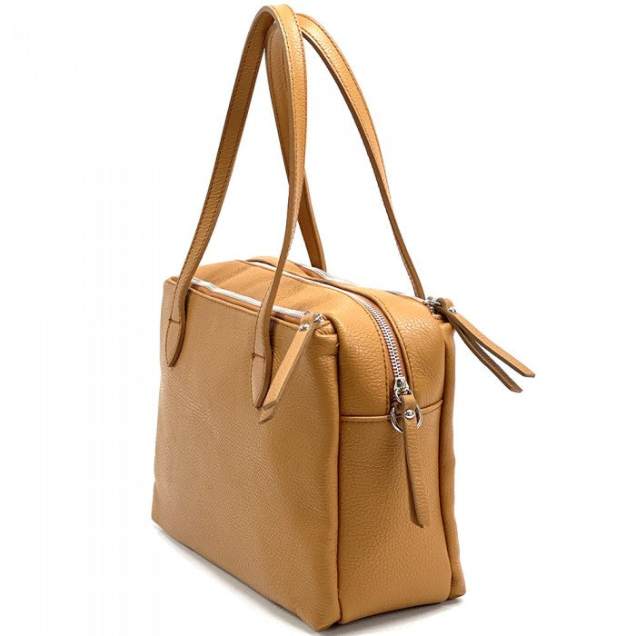 A tan-colored Annabella Leather Handbag with double handles and a removable shoulder strap, displayed against a white background.