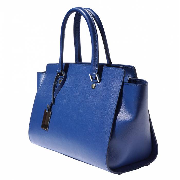 A blue leather handbag with golden metal hardware and a decorative tag on one of the handles.