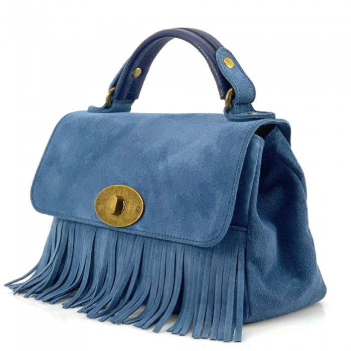 A leather handbag with a unique patterned handle and a detachable zebra-patterned shoulder strap.