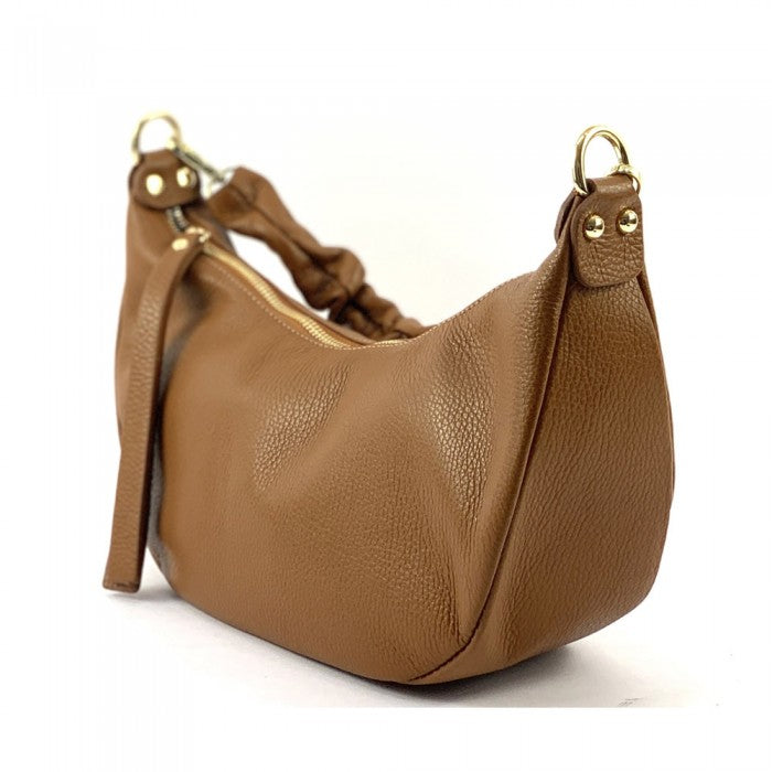 A brown Tara Small Hobo leather handbag with a single handle and adjustable shoulder strap.