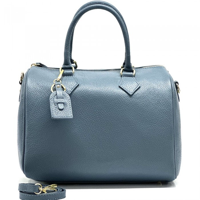 A Erminia GM cow leather handbag with visible texture, two handles, and metallic hardware.